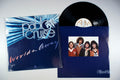 Pablo Cruise - World's Away (front cover) Vinyl