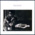 Paul Young - Between Two Fires (front cover) Vinyl