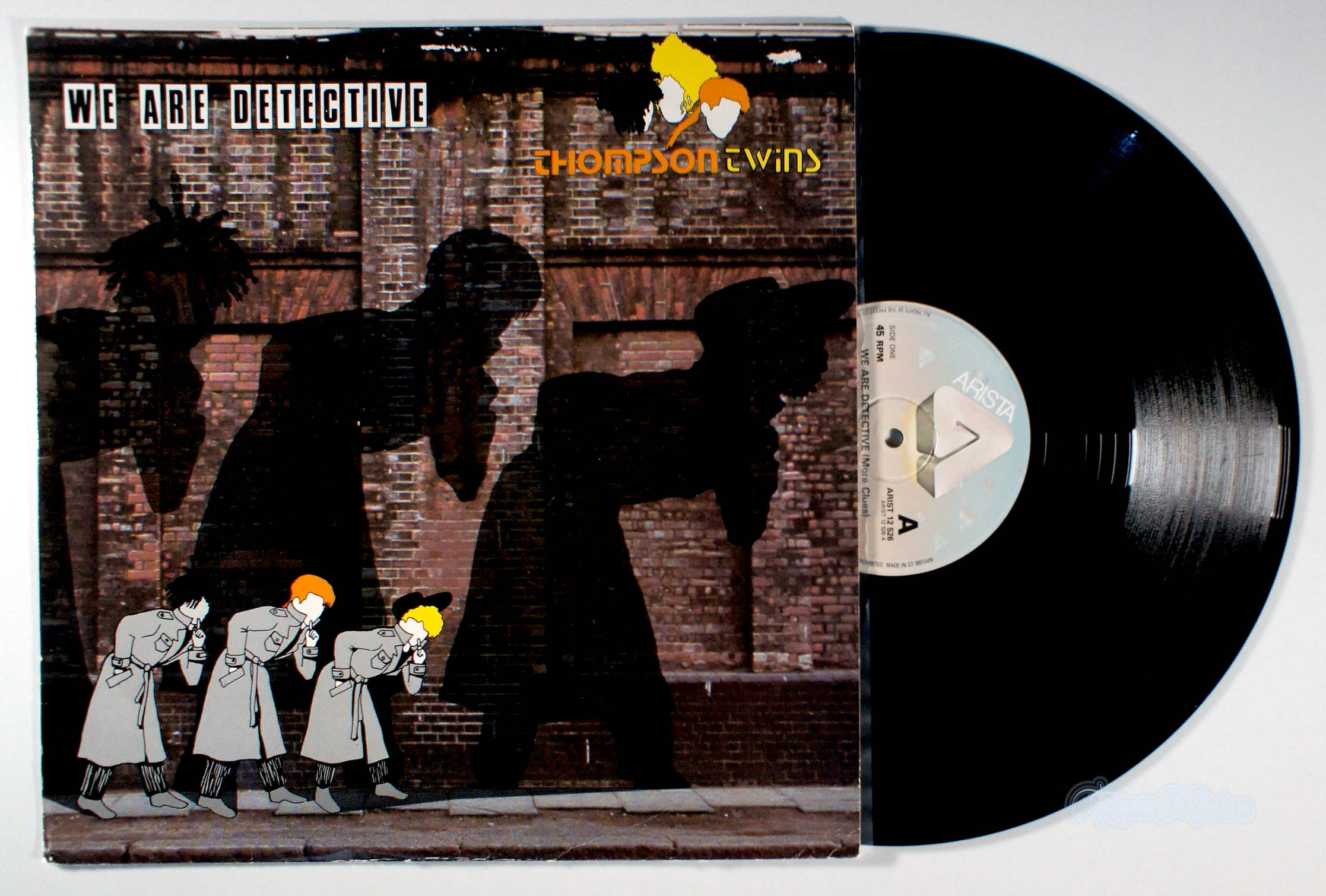 Thompson Twins - We Are Detective (12" Single) (front cover) Vinyl