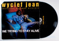 Wyclef Jean - We Trying To Stay Alive (12" Single) (front cover) Vinyl